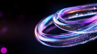 Glowing spiral light trails with sparkling particles in blue and purple neon colors against dark background create dynamic motion effect for technology designs.
