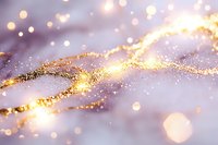 Magical golden glitter wave on soft purple background with bokeh lights and sparkles, creating dreamy abstract luxury design for festive occasions.