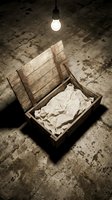 Open wooden crate with white fabric under dramatic lighting on concrete floor for mystery thriller horror film production concepts.
