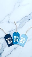 Three blue discount price tags showing 20%, 40%, and 60% off on marble background, perfect for retail sale promotions and shopping campaigns.