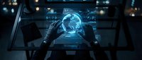 Futuristic holographic Earth globe projection on digital interface with hands interacting in high-tech control room environment for sci-fi technology concepts.