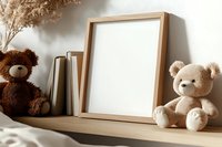 Mockup of wooden frame with teddy bears and books on shelf against white wall. Cozy neutral home decor with soft natural lighting and shadows.