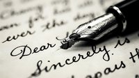 Fountain pen nib writing handwritten letter with Dear and sincerely text on white paper for correspondence, formal communication, business writing, stationery design.