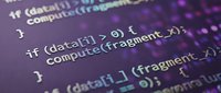 Programming code on computer screen showing conditional statements and data processing functions in purple and green syntax highlighting.