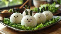 Cute rice balls with seaweed decorations shaped as happy faces on fresh lettuce leaves, served on ceramic plate. Japanese onigiri food art for bento lunch.
