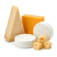 Assorted cheese varieties including aged cheddar, soft brie, and cubed portions isolated on white background for food, culinary, and dairy product design use.