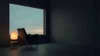Modern interior with silhouetted chair and glowing lamp facing large window at sunset, conveying solitude and contemplation for design and lifestyle projects.