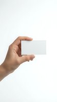 Hand holding blank white business card mockup on clean background for branding and corporate identity design projects.