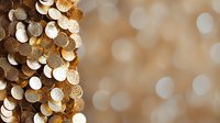 Glittering gold and white bokeh circles create abstract festive background with soft focus and blurred edges. Luxury party or celebration concept.
