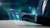 Businessman using futuristic holographic interface with cybersecurity icons and digital protection symbols on transparent screen technology.