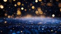 Magical nighttime cityscape with glowing bokeh lights floating above urban skyline, creating dreamy atmosphere against dark blue background. Perfect for holiday designs.