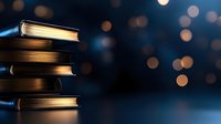 Stack of hardcover books on dark background with soft bokeh lights creating magical atmosphere for reading and education concepts.
