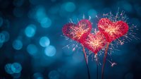 Glowing heart-shaped sparklers against dark blue bokeh background create romantic atmosphere for Valentine's Day celebrations and festive occasions.