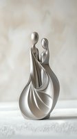 Minimalist silver sculpture depicting abstract couple in flowing, intertwined forms against neutral background. Modern art piece showing unity and connection.