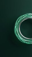 Glowing neon green and silver circular frame on dark teal background. Isolated design element suitable for tech, digital, and modern graphic projects.
