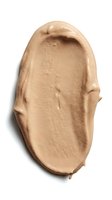 Beige liquid foundation or concealer swatch with smooth texture isolated on white background for cosmetic product design and beauty advertising.