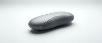 Sleek wireless computer mouse with ergonomic design on white background for technology and office use.