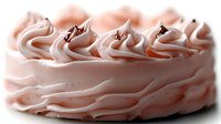 Pink frosted cake with decorative swirls and chocolate shavings on white background, isolated dessert ready for bakery marketing and culinary designs.