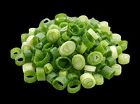 Chopped green onions isolated on transparent background, ready for culinary design, recipe graphics, food packaging, cooking blogs, restaurant menus, and print-on-demand kitchen products.