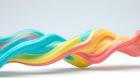 Abstract flowing waves in vibrant turquoise, yellow, pink and coral colors creating dynamic motion on white background for modern design projects.