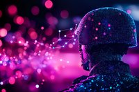 Futuristic soldier silhouette with digital network connections against purple bokeh background, representing military technology and cybersecurity concept.