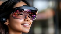 Young Asian woman wearing augmented reality smart glasses with colorful holographic display reflection, smiling while experiencing immersive technology.