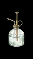 Vintage glass plant mister with brass pump, watercolor style, isolated on transparent background. Great for stickers, t-shirt design, print on demand, and sublimation crafts.