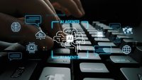 Business professional using laptop with AI agents digital interface overlay showing artificial intelligence automation technology concepts.