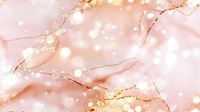 Luxurious rose gold marble texture with glowing bokeh effect and golden veins on soft pink background creates elegant abstract pattern for luxury design projects.