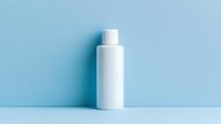 White cosmetic bottle on light blue background, minimalist product photography composition for beauty and skincare marketing and branding.