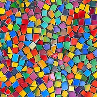Vibrant mosaic pattern with colorful irregular shapes in red, blue, green, yellow and purple creates seamless geometric background for fabric and wallpaper design.
