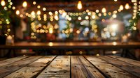 Rustic wooden table with blurred festive lights and string light decorations in background creating magical holiday atmosphere for product display.