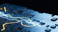 Blue circuit board with glowing pathways and electronic components showcasing modern technology and digital innovation for tech designs.