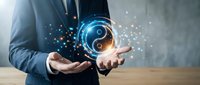 Businessman in blue suit holding glowing yin yang symbol with digital particles, representing balance, harmony, and duality in business strategy and spiritual wellness concepts.