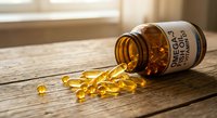Omega-3 fish oil capsules spilling from amber glass bottle on wooden surface with natural sunlight for health and wellness supplement concepts.