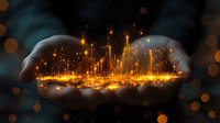 Futuristic smart city hologram floating in cupped hands with glowing golden lights and digital architecture for technology and urban planning concepts.