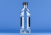Clear plastic water bottle with black cap on blue background, minimalist product photography style for beverage and packaging design concepts.