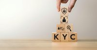 Hand placing wooden blocks spelling KYC with security icons representing know your customer compliance and identity verification processes.