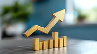 Golden bar graph with upward trending arrow showing business growth and success on wooden surface against blurred office background. Concept for financial progress.