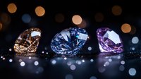 Sparkling diamonds in champagne, blue and pink colors on dark background with bokeh lights creating luxurious jewelry atmosphere. Precious gems macro photography.