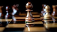 Wooden chess pawn piece on classic chessboard with dramatic lighting and shallow depth of field, highlighting strategy and competition in board game setting.