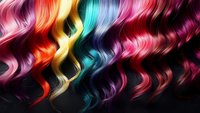 Vibrant multicolored wavy hair strands flowing against dark background showcasing rainbow spectrum of dyed hairstyles from pink to turquoise and purple for beauty salon promotion.