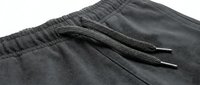 Gray athletic shorts with drawstring waistband isolated on white background. Comfortable sportswear for fitness training and casual wear.