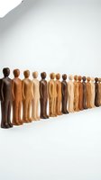 Wooden figurines in various skin tones standing in a line, representing diversity, inclusion, and unity. Suitable for business, community, and social concepts.