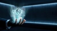 Businessman hand holding glowing yin yang symbol with digital interface, representing balance, harmony, and spiritual wellness in modern technology and business concepts.