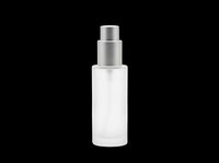 Frosted glass spray bottle with silver metallic pump isolated on transparent background, ready for cosmetics, skincare, and perfume product design use.