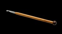 Wooden crochet hook with metal tip isolated on transparent background, ready for T-shirt design, clipart, stickers, print on demand, and sublimation projects.