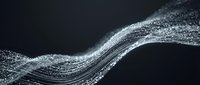 Glowing silver particle wave flows gracefully on dark background, creating a futuristic digital motion effect for tech and science projects.