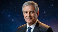 Middle-aged man with gray hair and light complexion wearing brown blazer and blue tie against starry night sky background for corporate or professional use.