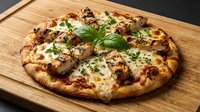 Freshly baked pizza with melted cheese, meat toppings and basil garnish on wooden serving board, ready for dining and food service use.